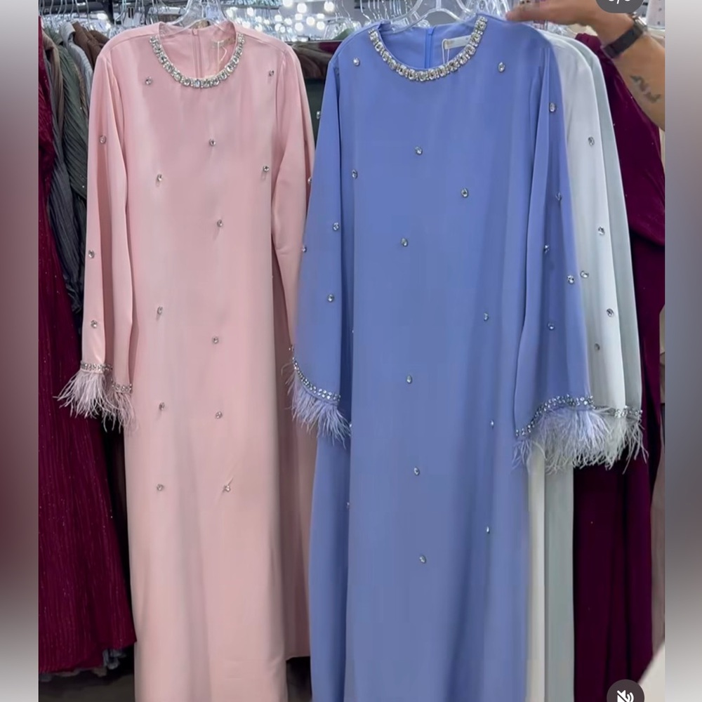 Dress with feathers and rhinestones. Suitable for Ramadan/ modest fashion